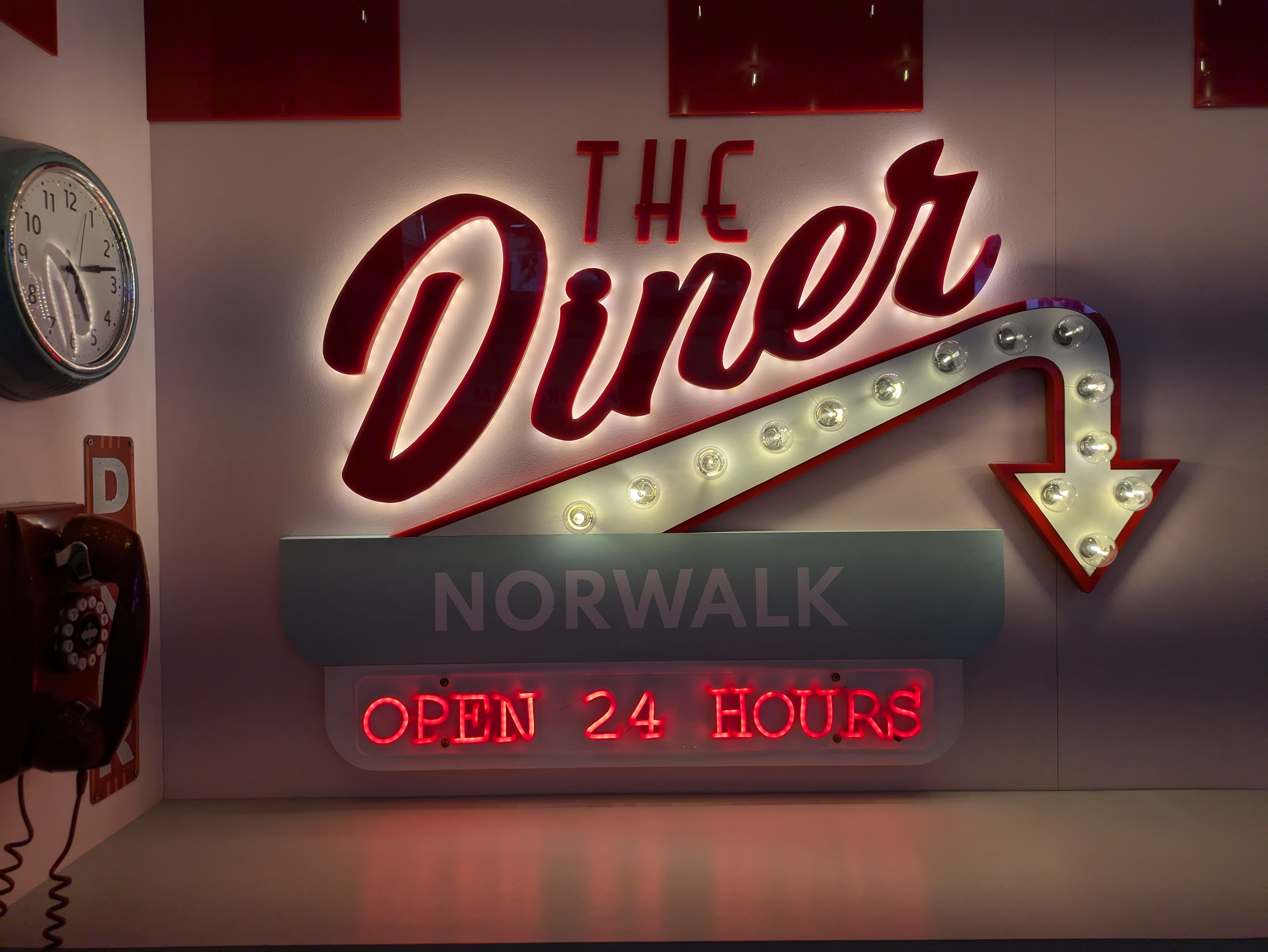 Google Pixel 8a camera sample showing a Diner sign Open 24 hours