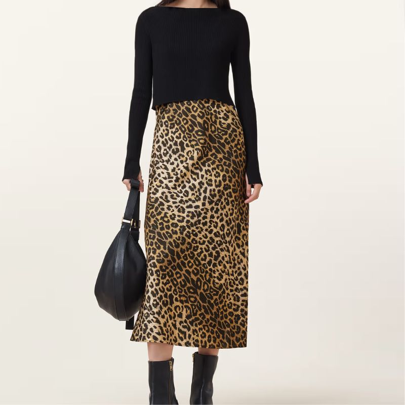 A model wears an All Saints leopard print dress