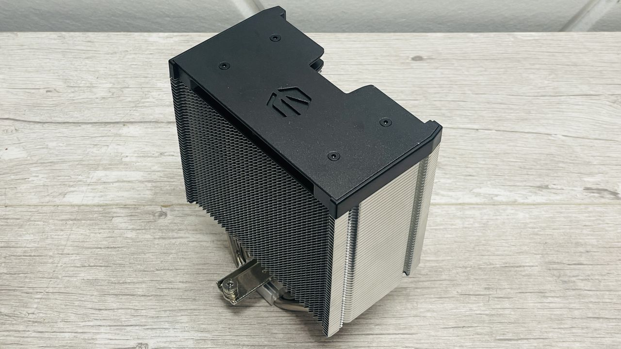 Endorfy Fortis 5 air cooler on a desk and loaded onto a motherboard.