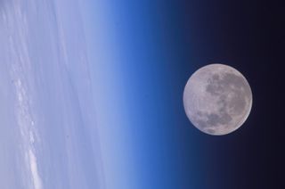 A brilliant full moon shines over Earth in this NASA file photo taken by astronauts aboard the International Space Station in 2005. The November 2017 full moon occurs Saturday (Nov. 4) at 1:22 a.m. EDT (0522 GMT).