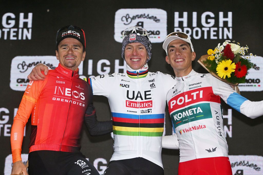 SAN LUCA ITALY OCTOBER 05 LR Thomas Pidcock of The United Kingdom and Team INEOS Grenadiers on second place race winner Tadej Pogacar of Slovenia and Team UAE Team Emirates and Davide Piganzoli of Italy and Team Polti Kometa on third place pose on the podium ceremony after the 107th Giro dellEmilia 2024 a 2153km one day race from Vignola to Bologna San Luca 267m on October 05 2024 in San Luca Italy Photo by Dario BelingheriGetty Images