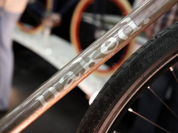 The masked down tube logo on Naked's city bike is well in keeping with the goal of keeping things simple.