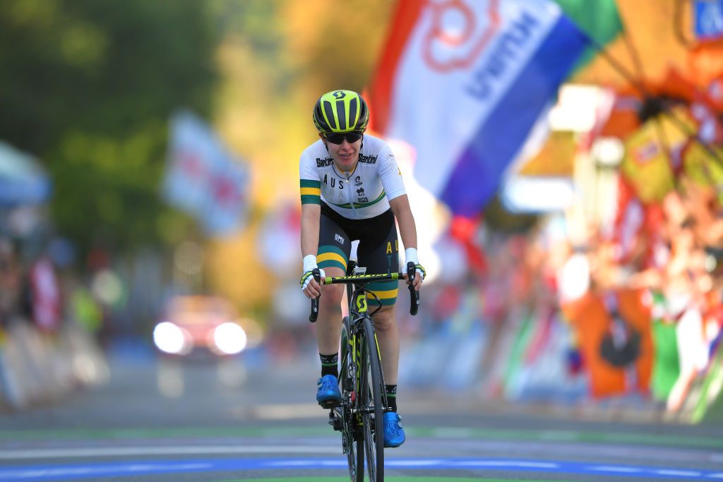Amanda Spratt (Australia) solos in for silver
