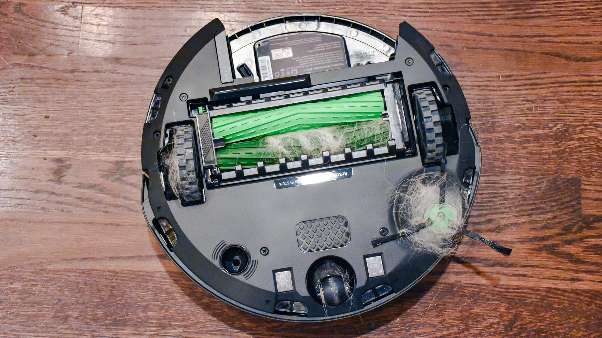 Bottom of iRobot Roomba j7+ after cleaning dog fur