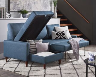 A blue sectional sleeper sofa from iNSPIRE Q Modern