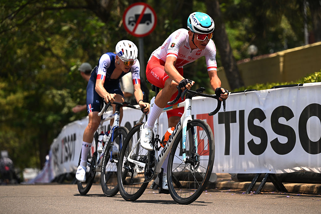 Johan Blanc (France) and Jan Michal Jackowiak (Poland) en route to their podium places behind Hudson