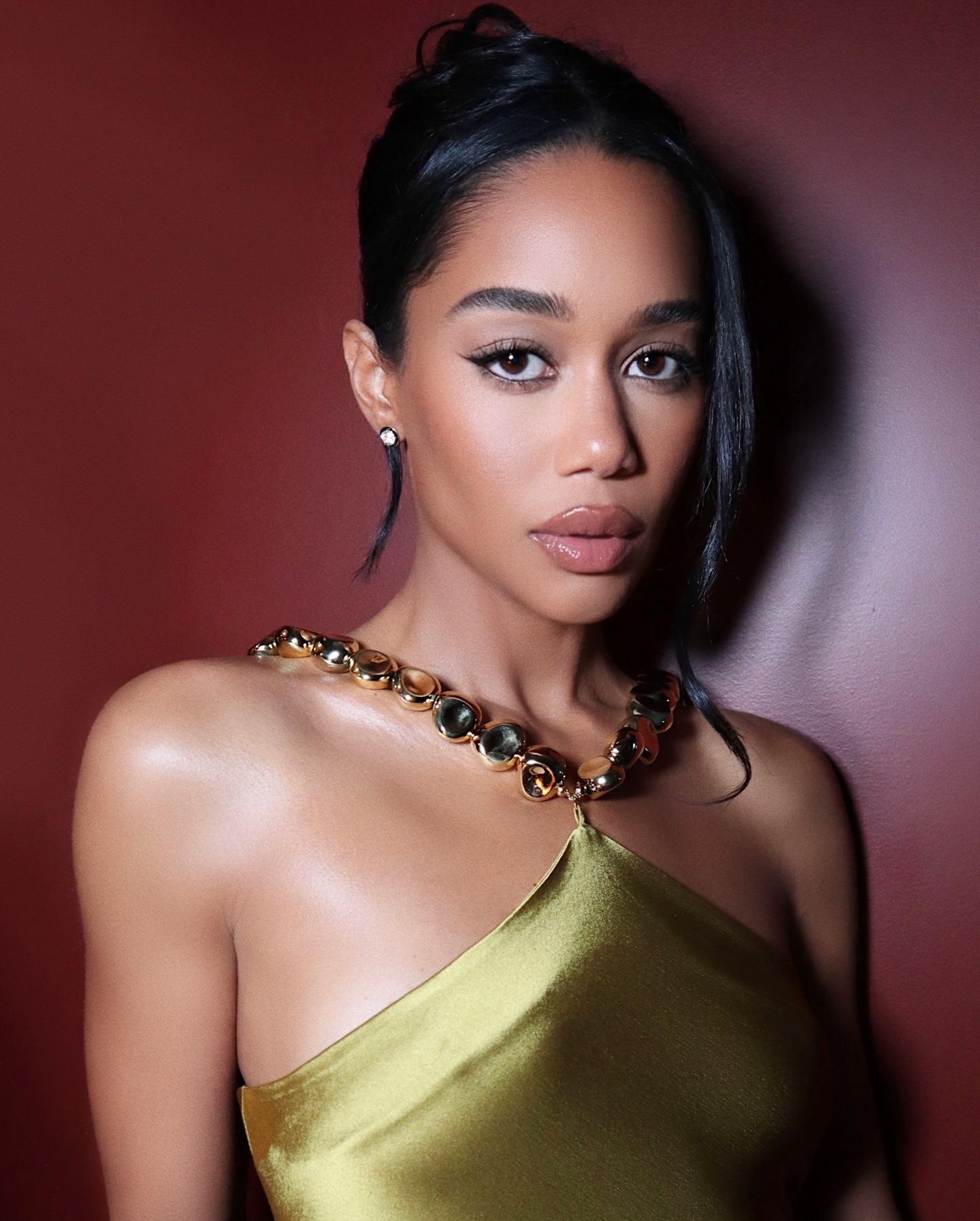 A photo of Laura Harrier with winged eye makeup