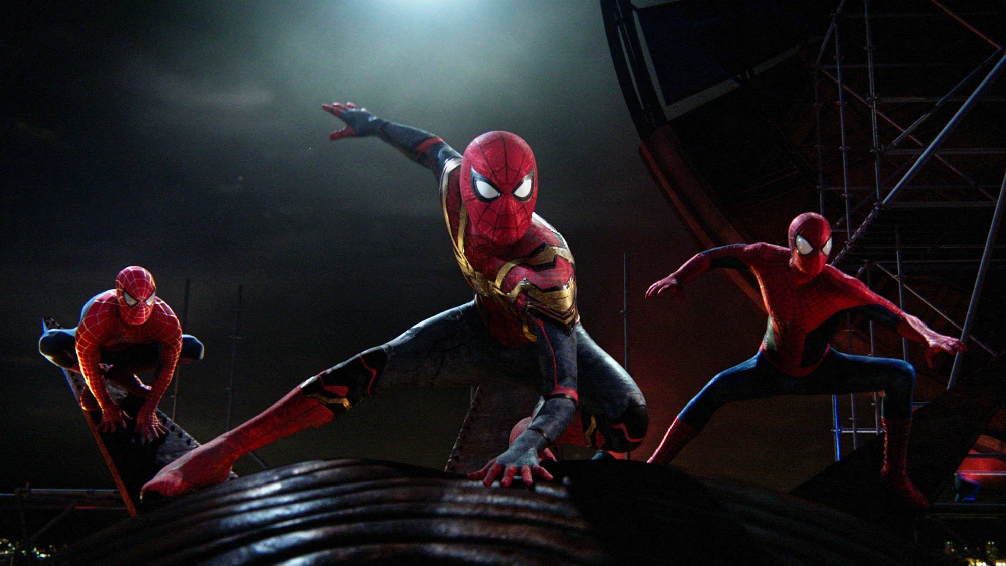 Tobey Maguire, Tom Holland, and Andrew Garfield in their Spider-Man suits in "Spider-Man: No Way Home" (2021)