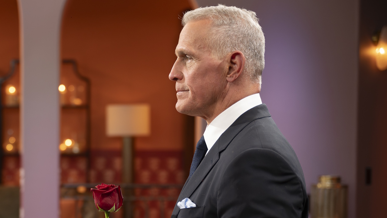 Mel Owens prepares to hand out a rose at a rose ceremony on The Golden Bachelor Season 2.