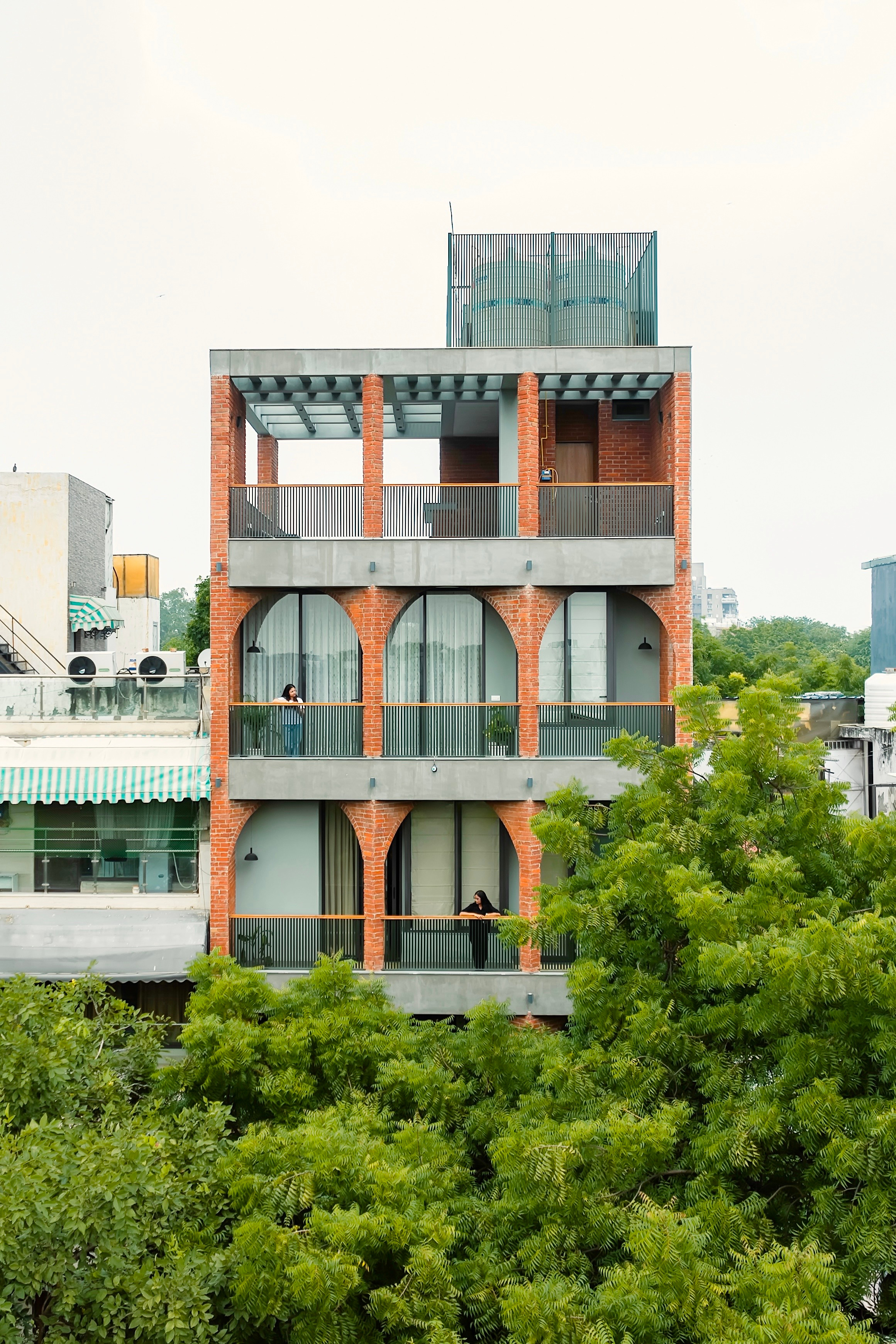 A pergola covers the top floor terrace