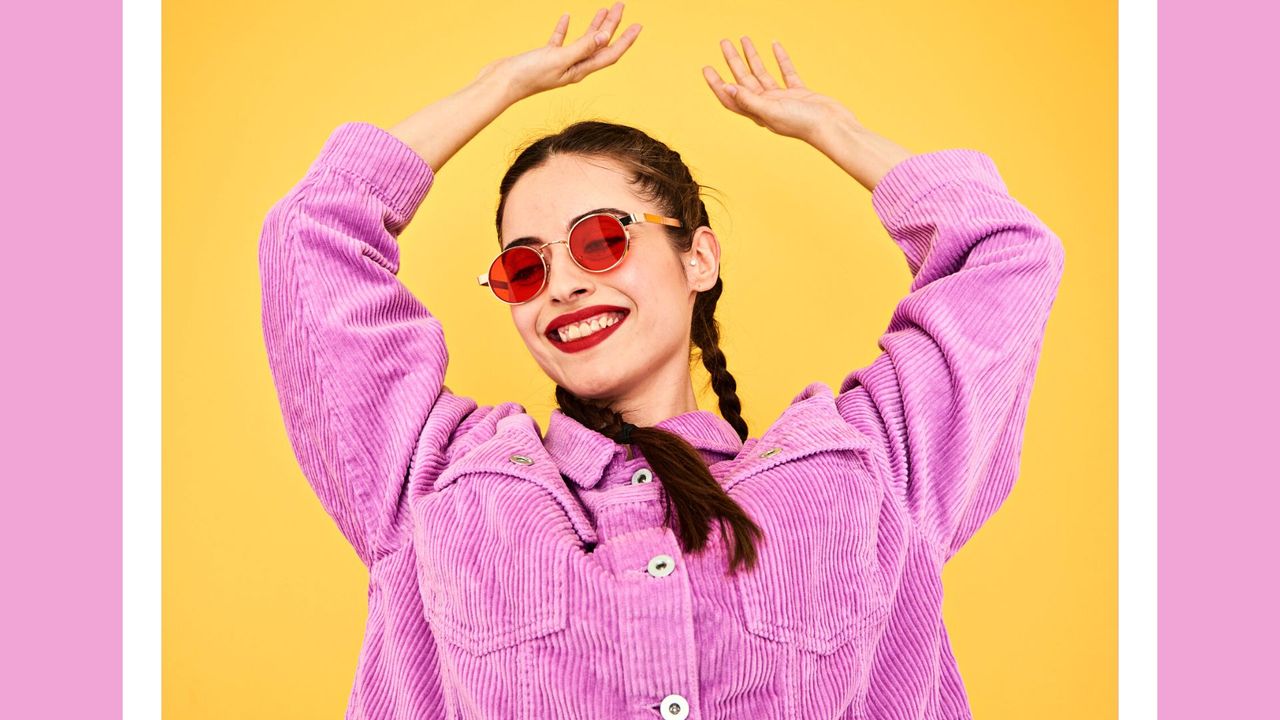 Colourful studio portrait of a young woman