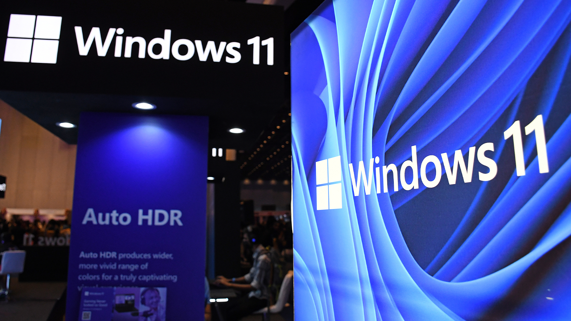 Windows 11 promotional banners and company branding pictured at the Microsoft vendor stall at Mumbai Comic Con 2023.