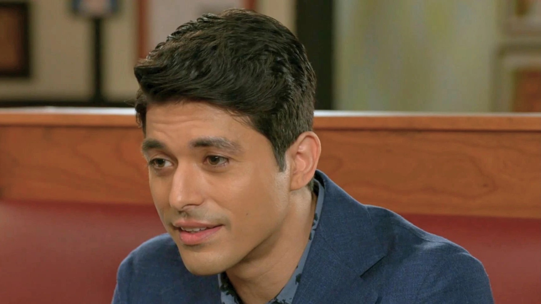Alex Alegria as Tomas in a diner in Beyond the Gates