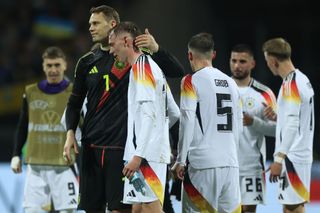 Germany Euro 2024 squad Manuel Neuer of Germany hugs Maximilian Beier after the international friendly match between Germany and Ukraine at Max-Morlock-Stadion on June 03, 2024 in Nuremberg, Germany. (Photo by Alex Grimm/Getty Images)