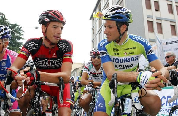 Alessandro Ballan and Ivan Basso have a chat before the start.