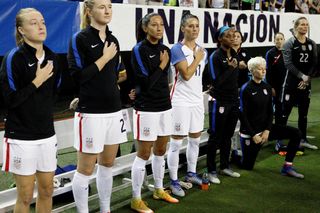 Megan Rapinoe of the USA takes the knee during the national anthem, 2016