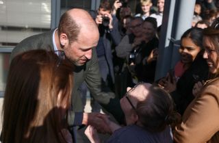 Prince William embraces fan Natasha Gorry during visit to Homewards Bournemouth, Christchurch and Poole (BCP) on February 28, 2025