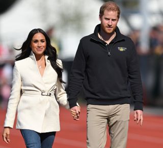 Prince Harry, Duke of Sussex and Meghan, Duchess of Sussex attend the athletics event during the Invictus Games