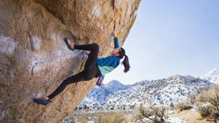 A woman bouldering