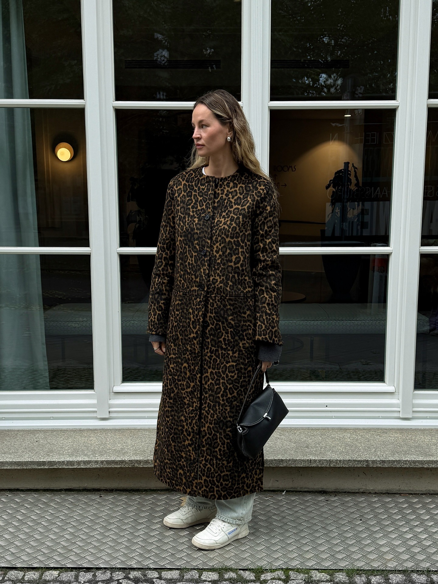 Woman in leopard-print coat.