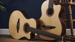 Two Yamaha classical guitars in a room with dark blue walls