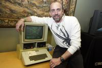 Richard Garriott poses with an Apple 2 Plus with Akalabeth