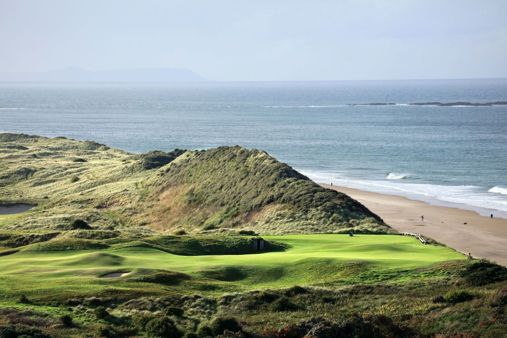 Royal Portrush 5th hole pictured with the beach and sea beyond