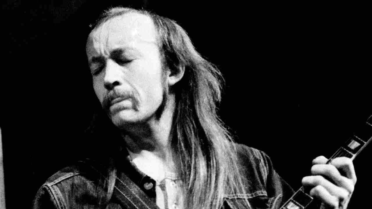 Tony McPhee of The Groundhogs performing onstage in the early 1970s