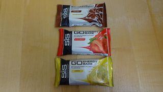 Three bars of SiS Go Energy Bake, which are among the best energy bars for cycling