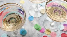 Confetti near glasses of champagne