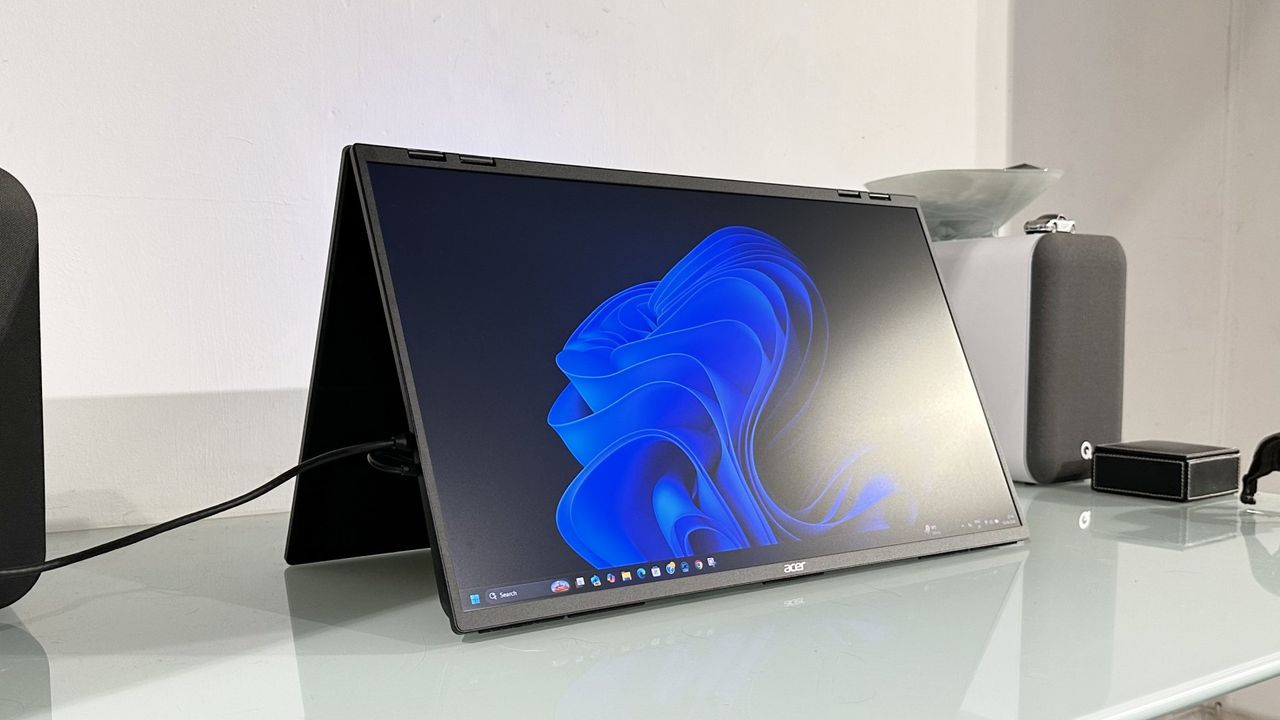 The Acer PD243Y E portable monitor in a home office during our testing