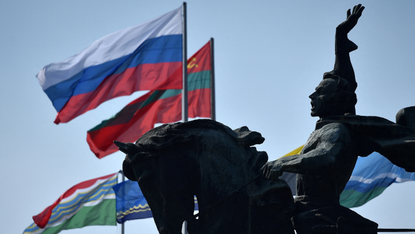 The Russian and Transnistrian flags fly next to each other