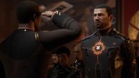 EVE Online guy getting a sort of holographic medal while a guy salutes him in Cradle of War expansion trailer.