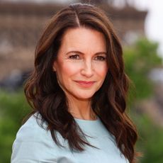 Kristin Davis poses for a photo in Paris