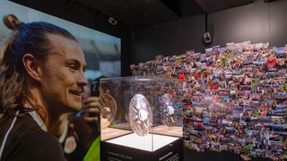 The FC St. Pauli Museum in Hamburg, here showing a display of a player's head and a glass-encased trophy, features a 7.1 loudspeaker system based around Genelec 8010 studio loudspeakers.