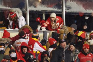 Taylor Swift attending chiefs games in chiefs color outfits