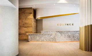 The marble reception desk at Equinox health club gym, Miracle Mile, Los Angeles