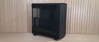 The Fractal Summit is a good-looking, open-face mid-tower with real wood accents that's easy to build in. But noise-normalized thermals landed a bit warmer than we expected.