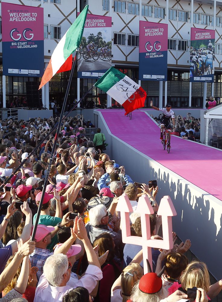 A rider takes his spot on the Giro presentation stage