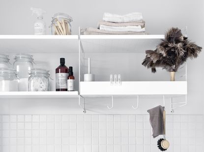 utility room shelving ideas with white shelves and glass jar containers