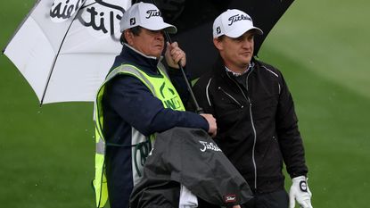 Bud Cauley of the United States and his caddie wait on the first fairway during the first round of the WM Phoenix Open at TPC Scottsdale on February 08, 2024 