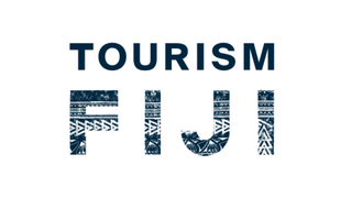 Logo for Tourism Fiji with dark blue lettering that contains traditional Fijian Masi patterns in the letterforms