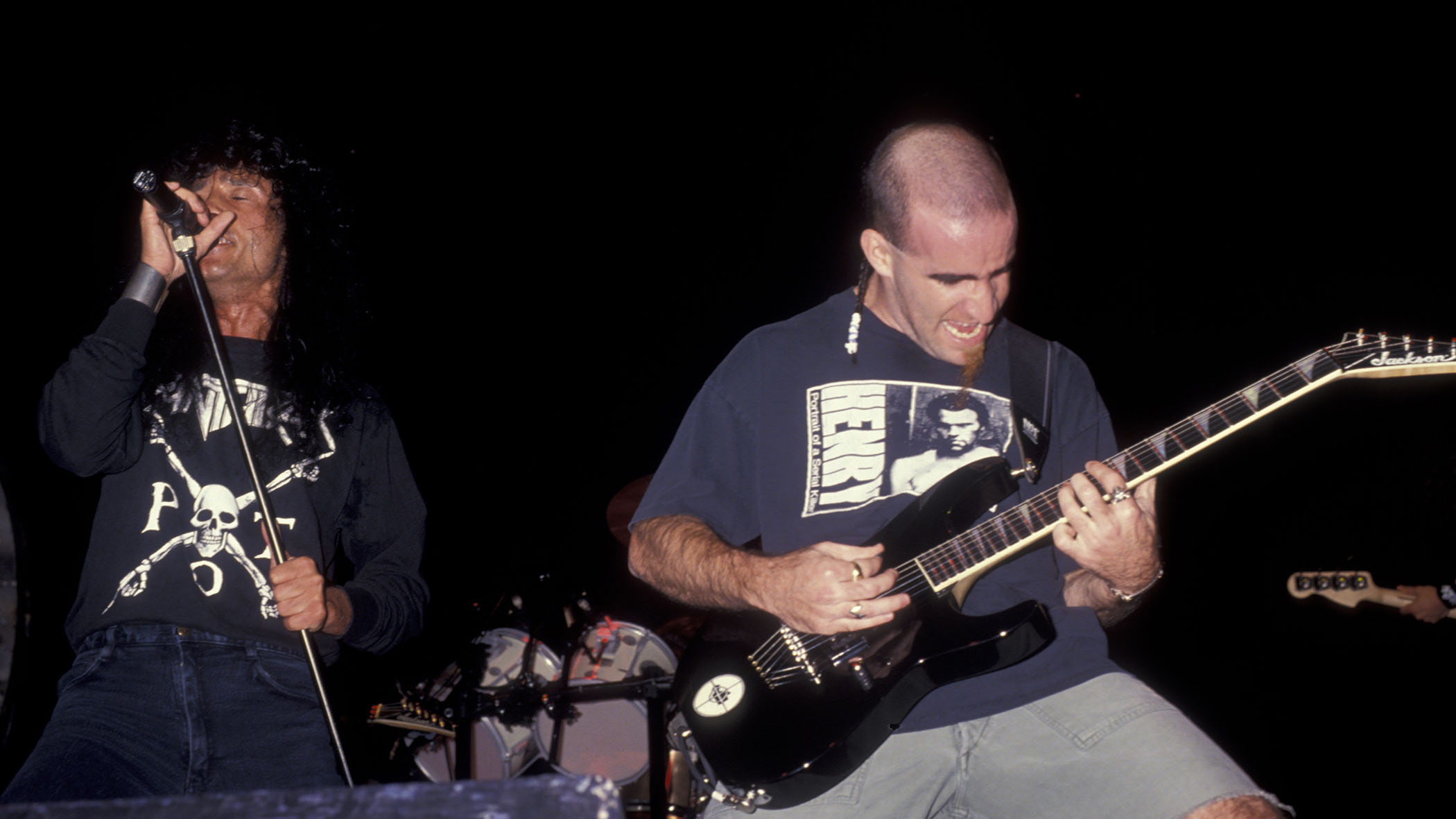 Joey Belladonna and Scott Ian of Anthrax play live in 1991.