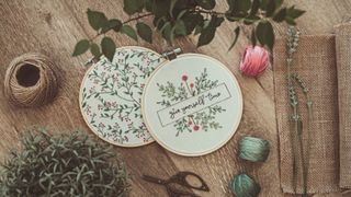 Embroidered positive affirmations on embroidery hoops