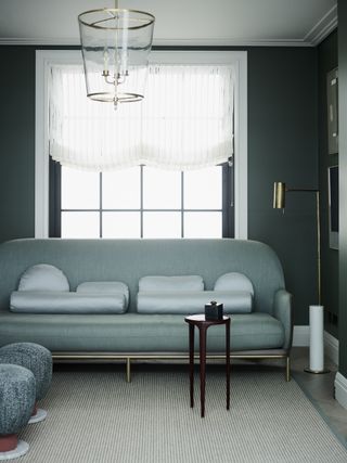 small living room with a teal color scheme