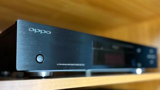 The Oppo UDP-203 in a media cabinet.
