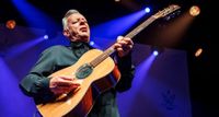 Tommy Emmanuel closes his eyes and goes for it onstage with his trusty Maton acoustic.