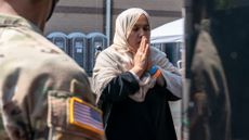 An Afghan refugee boards a bus in Chantilly, Virginia, in 2021.