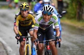 LAGOS DE COVADONGA SPAIN SEPTEMBER 01 LR Primoz Roglic of Slovenia and Team Jumbo Visma and Egan Arley Bernal Gomez of Colombia and Team INEOS Grenadiers White Best Young Rider Jersey compete in the Breakaway during the 76th Tour of Spain 2021 Stage 17 a 1855km stage from Unquera to Lagos de Covadonga 1085m lavuelta LaVuelta21 on September 01 2021 in Lagos de Covadonga Spain Photo by Tim de WaeleGetty Images