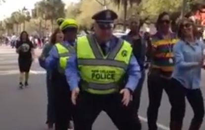 Even New Orleans cops caught the Mardi Gras spirit